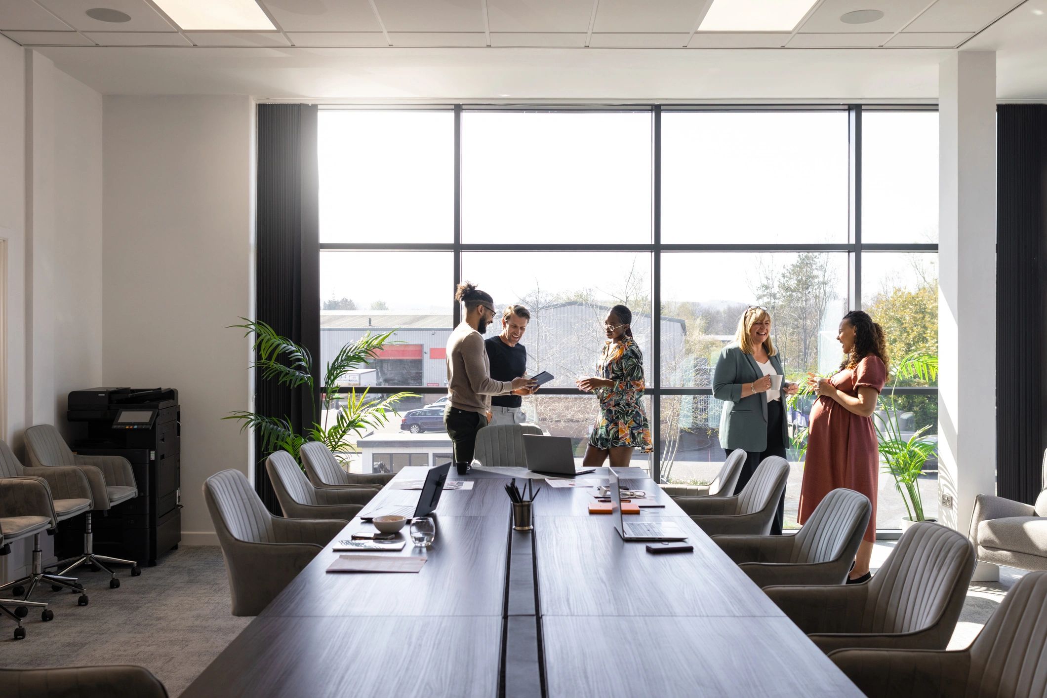 Business colleagues in a modern conference room discussing strategy